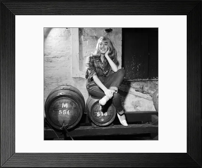 Framed Print : Julie Goodyear, aged 21, a Solicitors Secretary, is the daughter of the licensee of Framed Print : Julie Goodyear, aged 21, a Solicitors Secretary, is the daughter of the licensee of