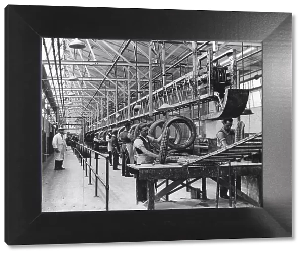 The Dunlop Factory in The West Midlands, England. Workers making tyres