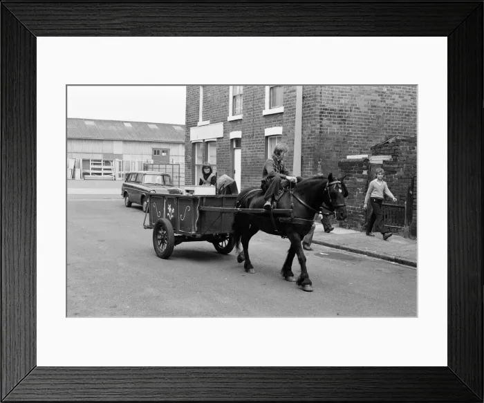 Framed Print : Russell Woods, Rag and bone boy in a residential street. 18th July 1975 Framed Print : Russell Woods, Rag and bone boy in a residential street. 18th July 1975