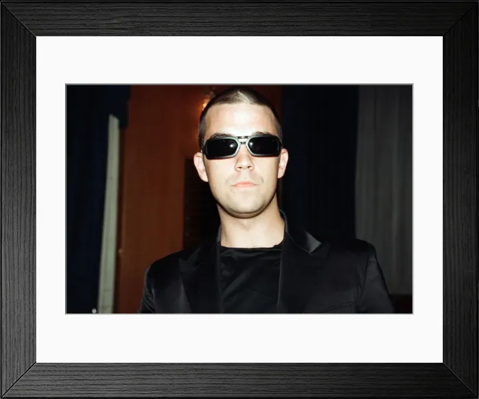 Framed Print : Robbie Williams attending the Elite Model Look of the Year competition, Connaught Rooms Framed Print : Robbie Williams attending the Elite Model Look of the Year competition, Connaught Rooms