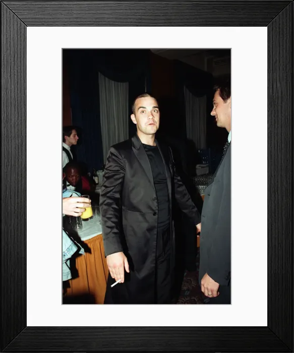 Framed Print : Robbie Williams attending the Elite Model Look of the Year competition, Connaught Rooms Framed Print : Robbie Williams attending the Elite Model Look of the Year competition, Connaught Rooms