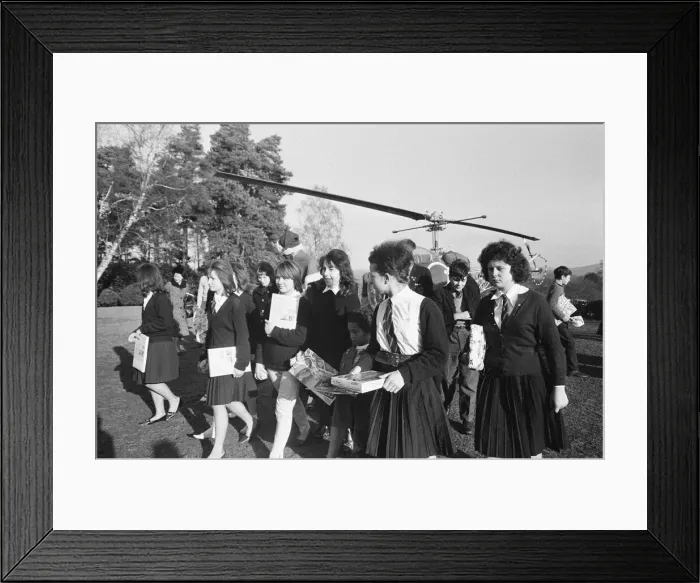 Framed Print : Santa Claus arrives by helicopter at Pestalozzi Village for Children in Sedlescombe