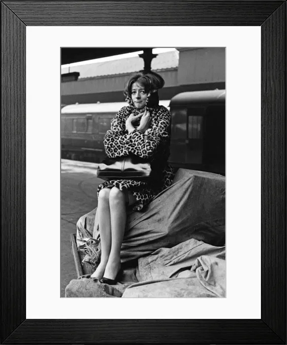 Framed Print : Actress Maggie Smith pictured on a train station platform as she waits for a train Framed Print : Actress Maggie Smith pictured on a train station platform as she waits for a train