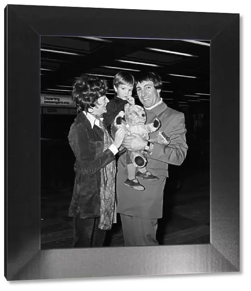 Maggie Smith with her husband Robert Stephens and their son Christopher departing