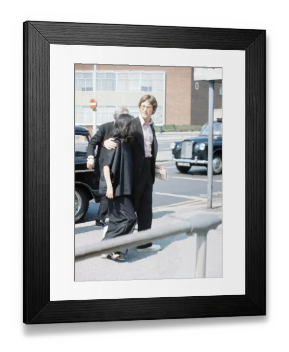 Framed Print : Former member of The Beatles pop group John Lennon with his wife Yoko Ono at Heathrow Framed Print : Former member of The Beatles pop group John Lennon with his wife Yoko Ono at Heathrow