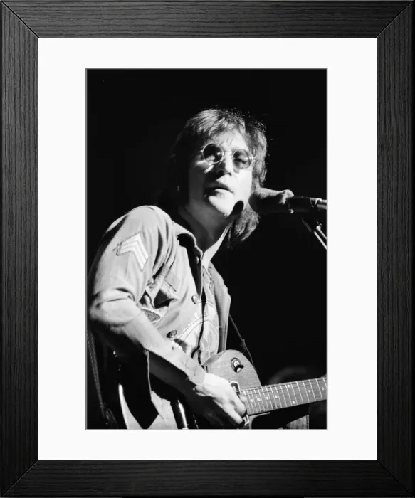 Framed Print : Former singer of The Beatles pop group John Lennon pictured performing on stage during Framed Print : Former singer of The Beatles pop group John Lennon pictured performing on stage during