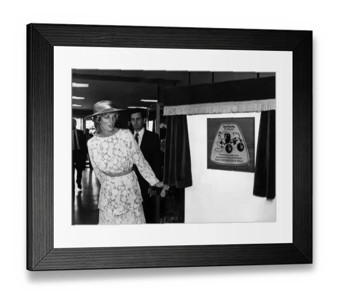 Framed Print : HRH The Princess of Wales, Princess Diana unveils a plaque at the new Fisher-Price Toy