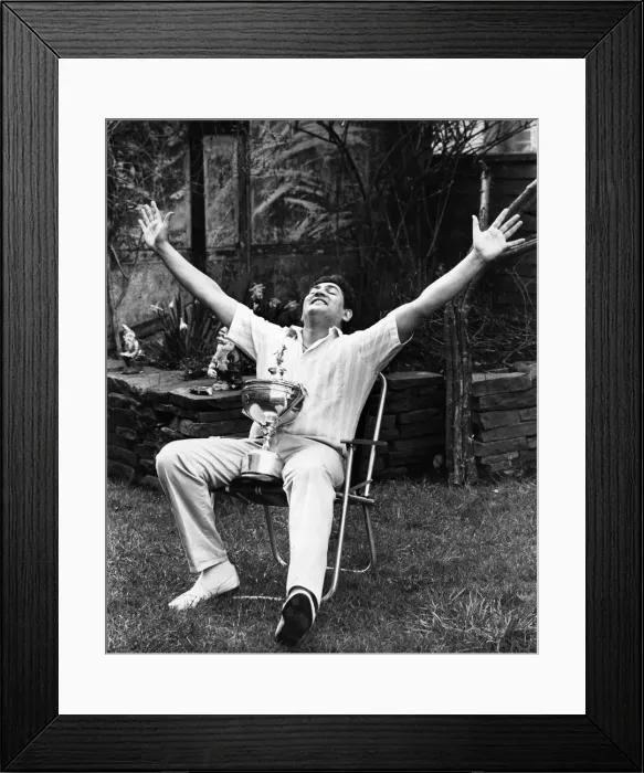 Framed Print : New snooker World Champion Joe Johnson holds on to the trophy at home the day after his Framed Print : New snooker World Champion Joe Johnson holds on to the trophy at home the day after his