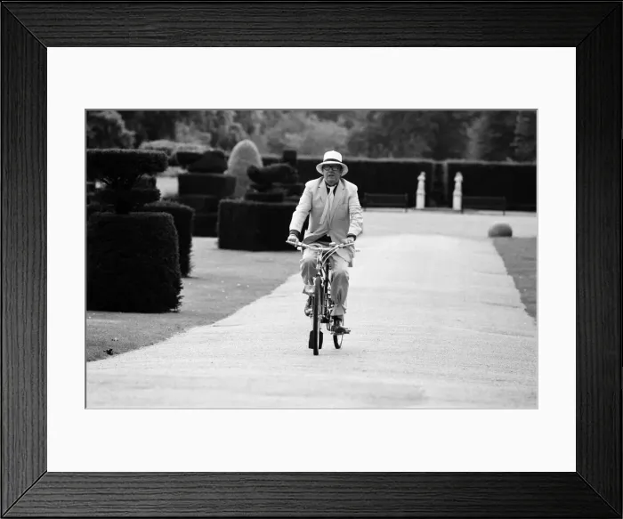 Framed Print : Eric Morecambe on location at Hever Castle, where he is making a comedy film Framed Print : Eric Morecambe on location at Hever Castle, where he is making a comedy film
