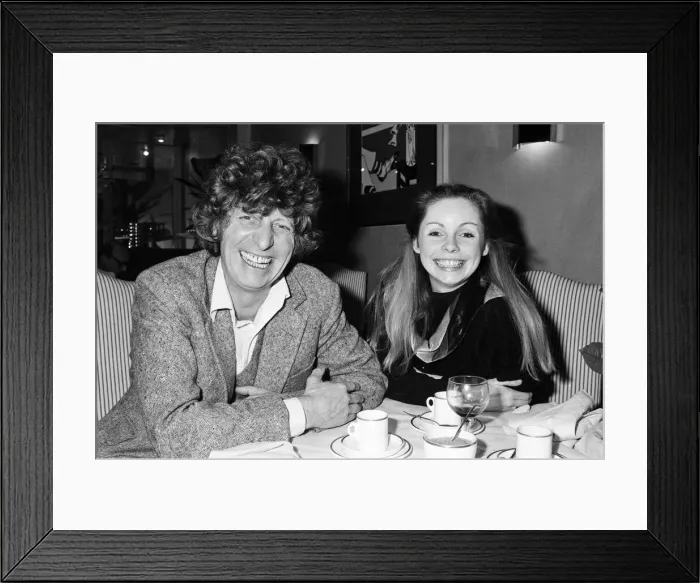 Framed Print : Tom Baker and his wife Lalla Ward at a restaurant in Chelsea with her parents