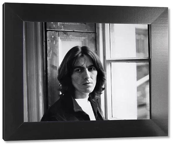 George Harrison of The Beatles pop group pictured at the Apple Headquarters in London