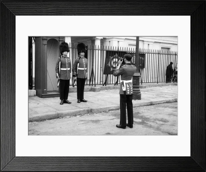 Framed Print : Guardsmen have a snapshot of themselves at the Wellington Barracks Framed Print : Guardsmen have a snapshot of themselves at the Wellington Barracks