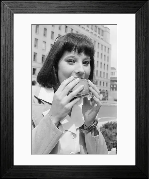 Framed Print : Sandwich Feature, Manchester, 21st August 1974. Young woman takes a lunch break Framed Print : Sandwich Feature, Manchester, 21st August 1974. Young woman takes a lunch break