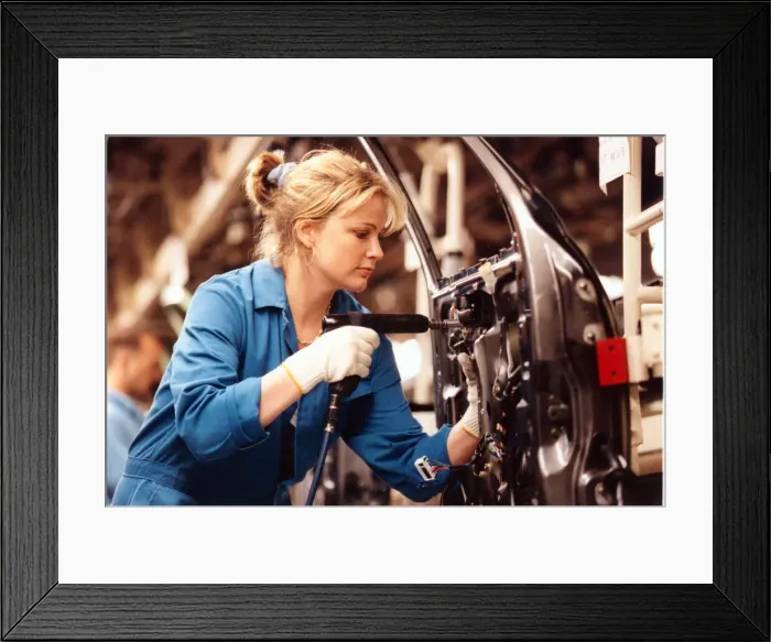 Framed Print : Rosie Waller, Newcastle Chronicle feature writer working on the Nissan Primera Production Framed Print : Rosie Waller, Newcastle Chronicle feature writer working on the Nissan Primera Production