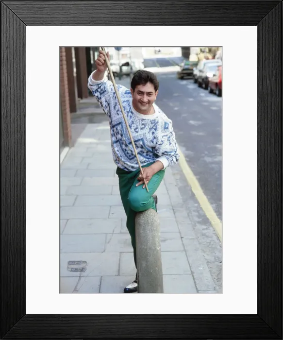 Framed Print : World snooker champion Joe Johnson poses with cue in the street. 28th May 1986 Framed Print : World snooker champion Joe Johnson poses with cue in the street. 28th May 1986