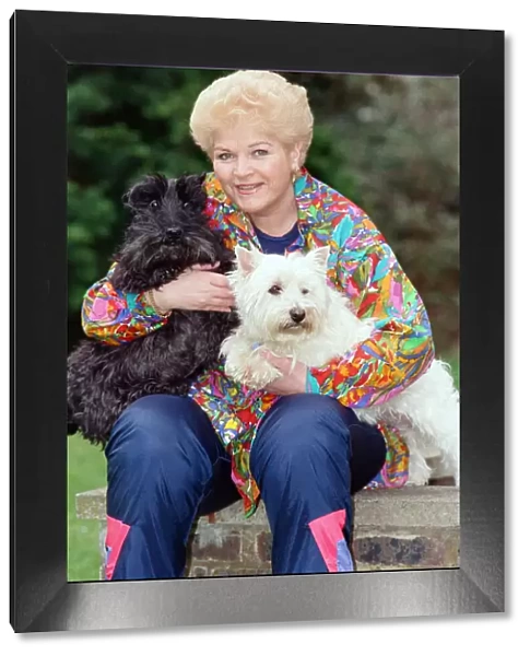 Actress Pam St. Clement with her two pet dogs. 14th April 1992