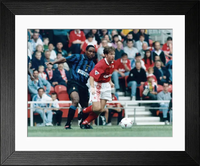 Framed Print : Middlebrough player Craig Hignett seen here in action against Paul Ince of Inter Milan in Framed Print : Middlebrough player Craig Hignett seen here in action against Paul Ince of Inter Milan in