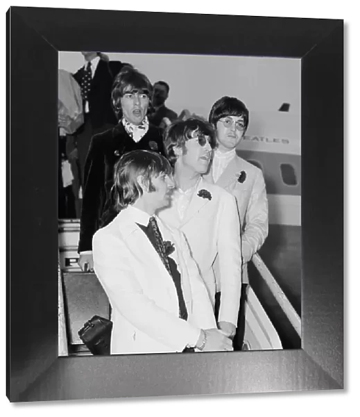 The Beatles arriving at London Heathrow Airport after their last ever concert tour of