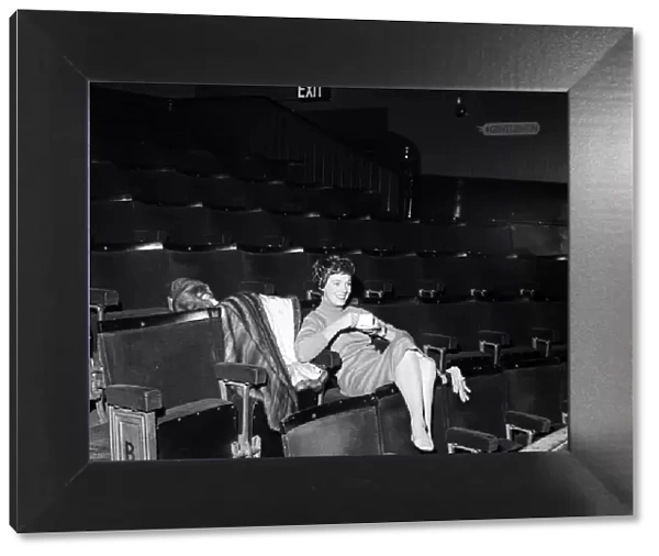 Julie Andrews watches her husband working on stage at the Lyric Theatre, Hammersmith