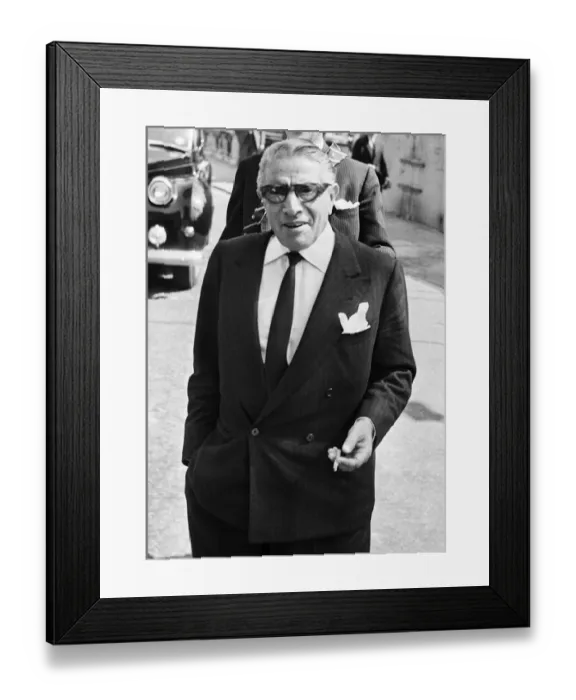 Framed Print : Greek shipping tycoon Aristotle Onassis attends the Law Courts in London to sue 77 year