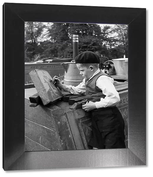 Harold Collins, age 8, of the canal boat 'Whitley and Bayswater'