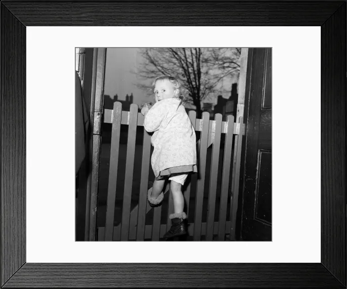 Framed Print : Rosemary Street Nursery School, Bristol. Pictured, a girl from the nursery school who has Framed Print : Rosemary Street Nursery School, Bristol. Pictured, a girl from the nursery school who has