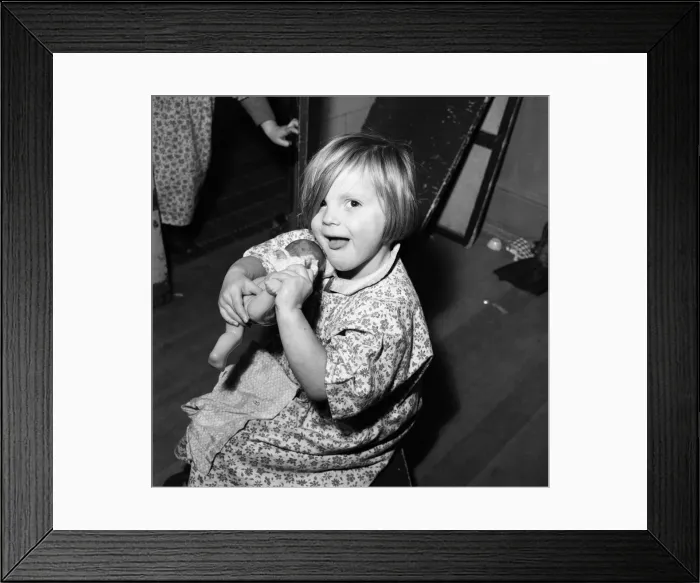Framed Print : Rosemary Street Nursery School, Bristol. Pictured, underneath all that hair is a laughing Framed Print : Rosemary Street Nursery School, Bristol. Pictured, underneath all that hair is a laughing