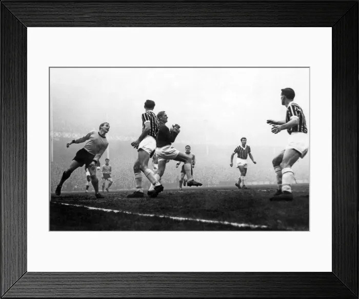 Framed Print : Trautmann is well supported by Manchester City defenders as he catches a shot from Vernon Framed Print : Trautmann is well supported by Manchester City defenders as he catches a shot from Vernon