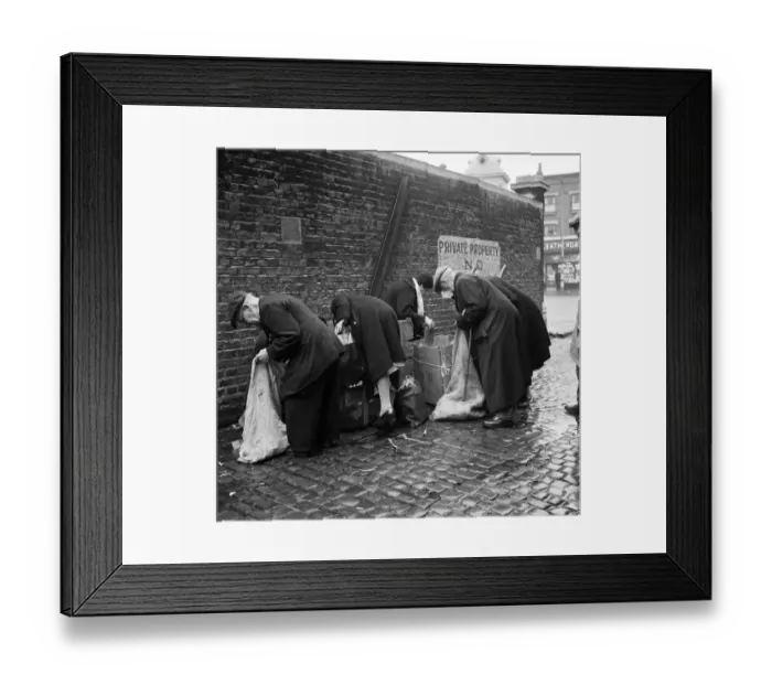 Framed Print : OAPs collecting firewood outside a furniture factory in Denmark Hill, London Framed Print : OAPs collecting firewood outside a furniture factory in Denmark Hill, London