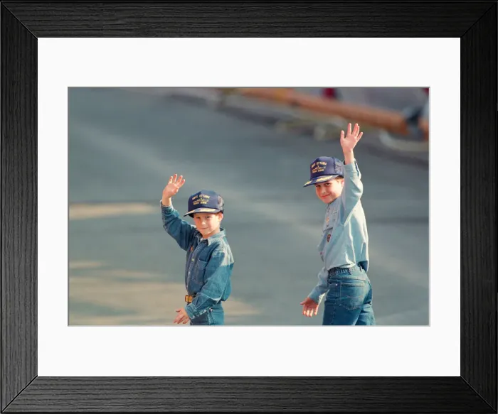 Framed Print : Prince Harry (left) and Prince William (right) wave to the cameras during their tour of Framed Print : Prince Harry (left) and Prince William (right) wave to the cameras during their tour of