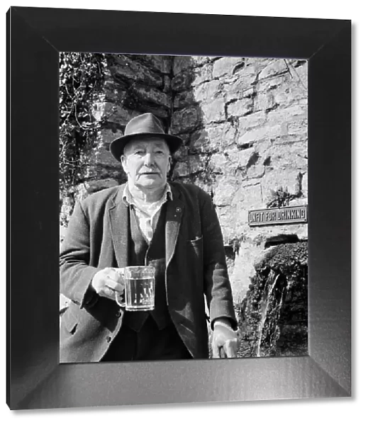 80-year-old Bob Smart drinking at the Batheaston horse trough. 26th March 1971