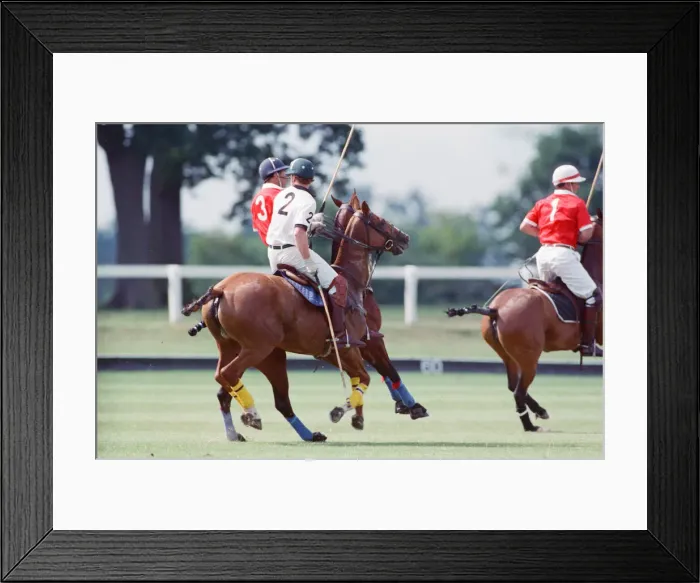 Framed Print : Prince Charles (Red shirt wearing number 3) was locked in a fierce battle with Princess Framed Print : Prince Charles (Red shirt wearing number 3) was locked in a fierce battle with Princess