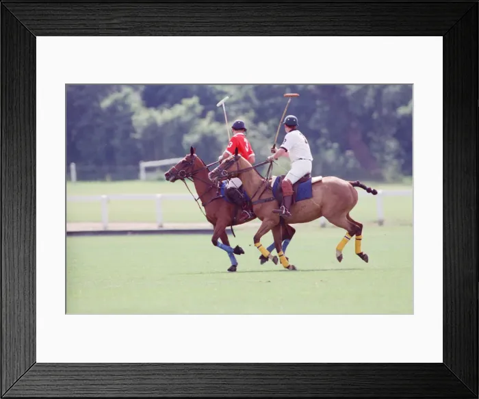 Framed Print : Prince Charles (Red shirt wearing number 3) was locked in a fierce battle with Princess Framed Print : Prince Charles (Red shirt wearing number 3) was locked in a fierce battle with Princess