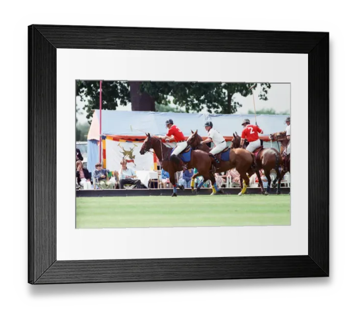 Framed Print : Prince Charles (Red shirt wearing number 3) was locked in a fierce battle with Princess