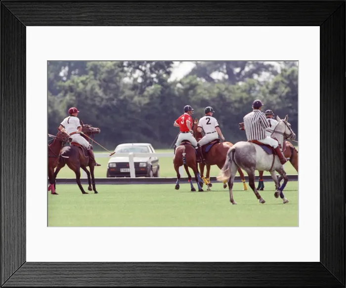 Framed Print : Prince Charles (Red shirt wearing number 3) was locked in a fierce battle with Princess Framed Print : Prince Charles (Red shirt wearing number 3) was locked in a fierce battle with Princess