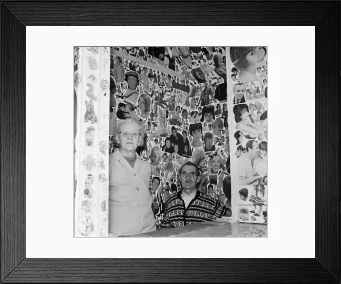 Framed Print : Mr Arthur Piper, 73, and his 80-year-old wife Sarah in the decorated bedroom of their