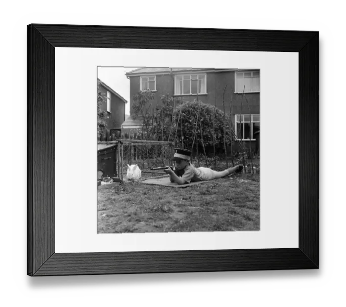 Framed Print : David Kilgour, aged 8, who wants to be a soldier seen at his home in Mochdre, Colwyn Bay