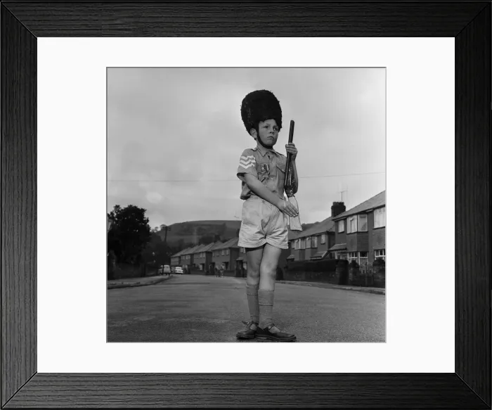 Framed Print : David Kilgour, aged 8, who wants to be a soldier seen at his home in Mochdre, Colwyn Bay
