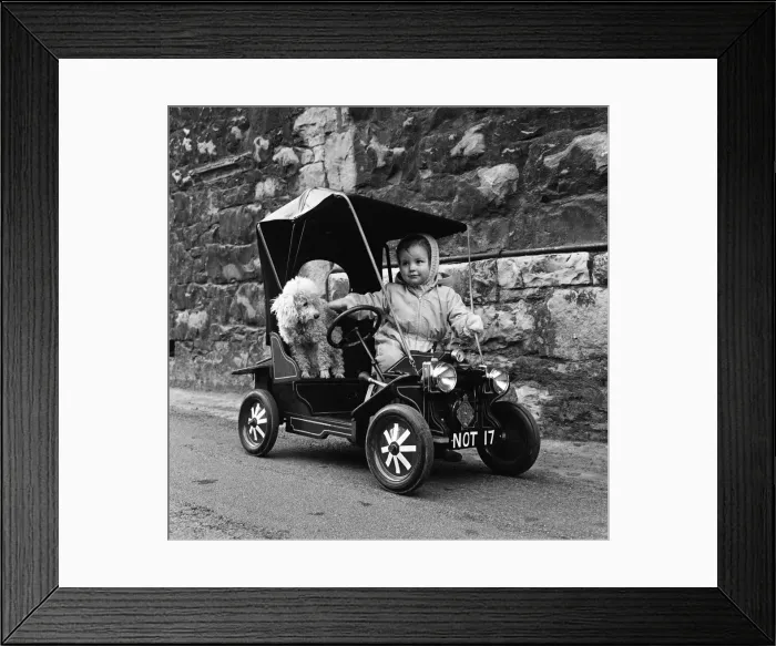 Framed Print : Judy Oliver in her vintage baby car. 1st March 1964 Framed Print : Judy Oliver in her vintage baby car. 1st March 1964