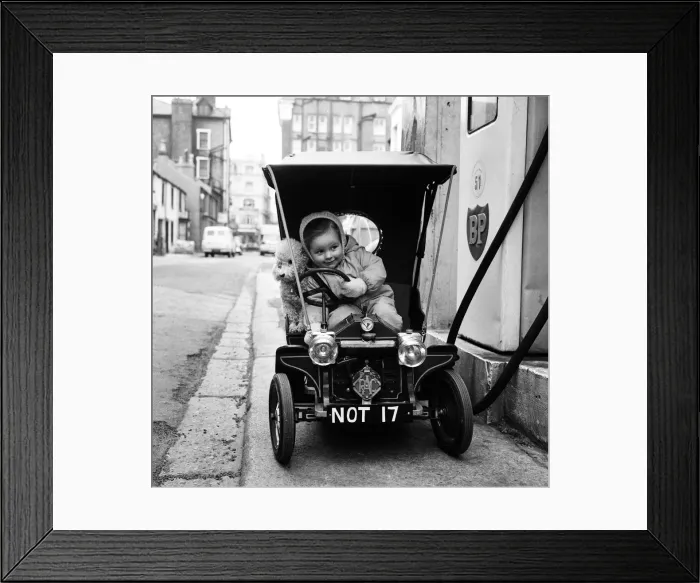 Framed Print : Judy Oliver in her vintage baby car. 1st March 1964 Framed Print : Judy Oliver in her vintage baby car. 1st March 1964