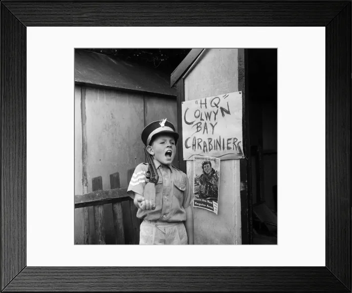 Framed Print : David Kilgour, aged 8, who wants to be a soldier seen at his home in Mochdre, Colwyn Bay