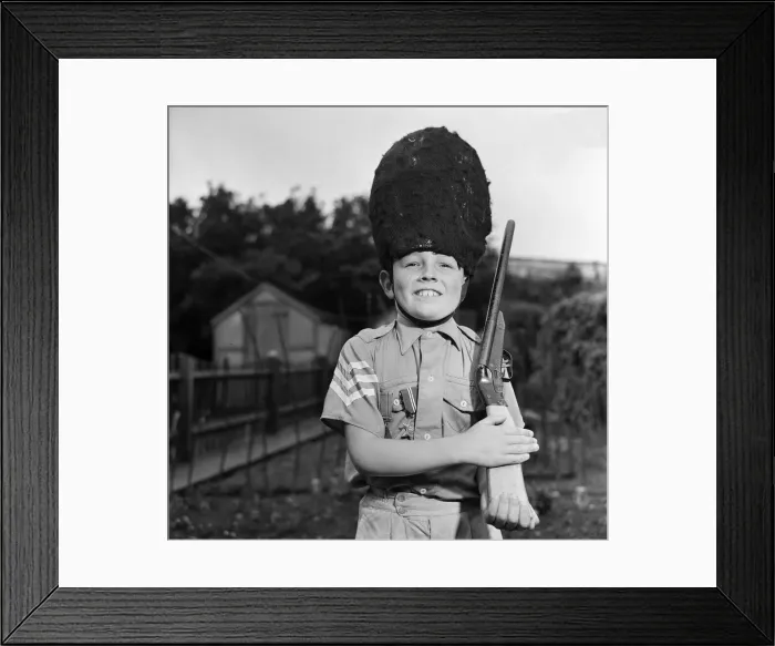 Framed Print : David Kilgour, aged 8, who wants to be a soldier seen at his home in Mochdre, Colwyn Bay Framed Print : David Kilgour, aged 8, who wants to be a soldier seen at his home in Mochdre, Colwyn Bay