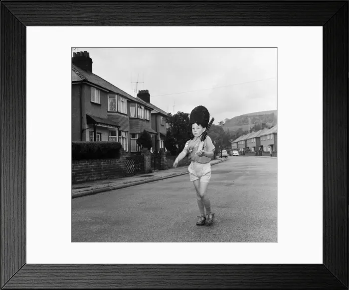 Framed Print : David Kilgour, aged 8, who wants to be a soldier seen at his home in Mochdre, Colwyn Bay Framed Print : David Kilgour, aged 8, who wants to be a soldier seen at his home in Mochdre, Colwyn Bay