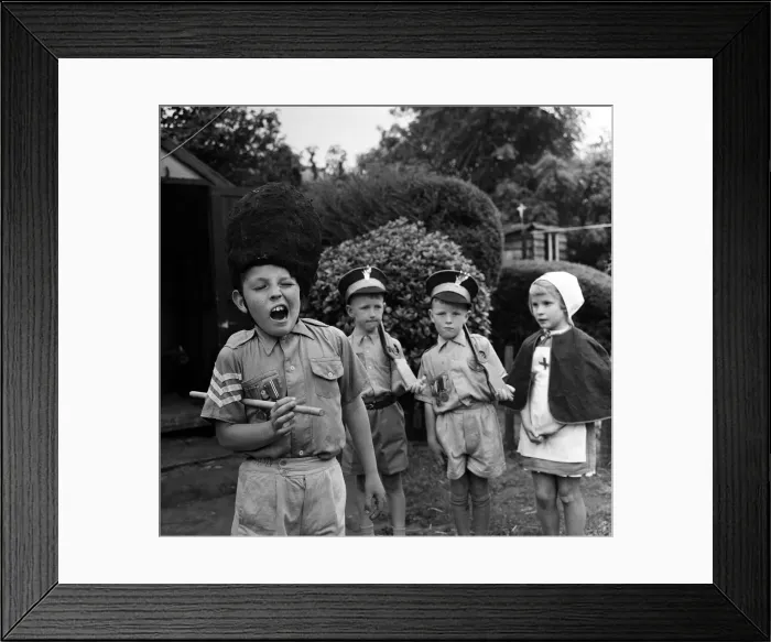Framed Print : David Kilgour, aged 8, who wants to be a soldier seen at his home in Mochdre, Colwyn Bay Framed Print : David Kilgour, aged 8, who wants to be a soldier seen at his home in Mochdre, Colwyn Bay