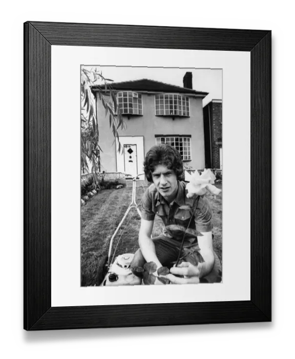 Framed Print : Manchester United footballer Brain Kidd in the garden of his home