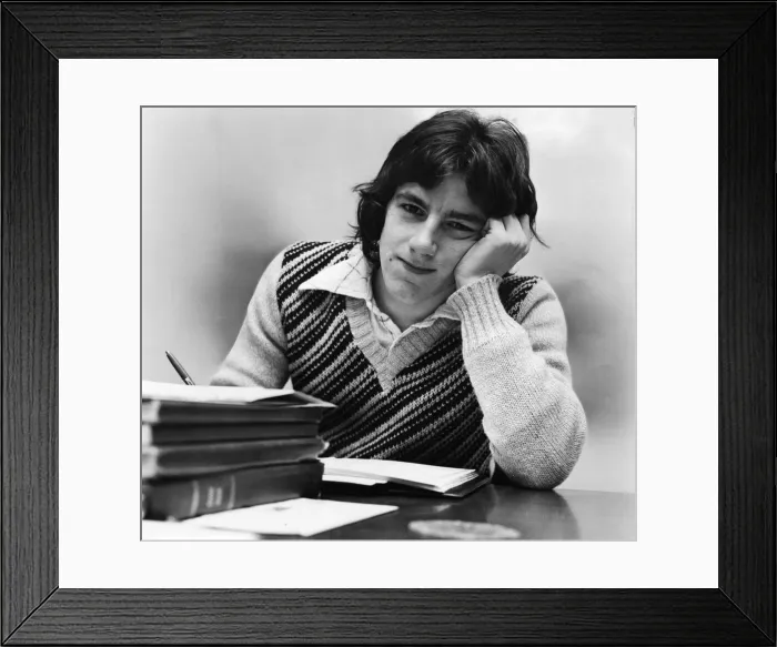 Framed Print : Tranmere Rovers footballer Steve Coppell sitting at his desk as he studies for his degree Framed Print : Tranmere Rovers footballer Steve Coppell sitting at his desk as he studies for his degree