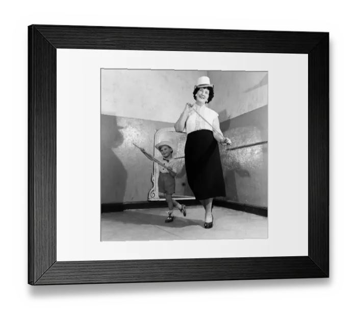 Framed Print : A grandmother teachers her grandson how to dance. 21st June 1955 Framed Print : A grandmother teachers her grandson how to dance. 21st June 1955