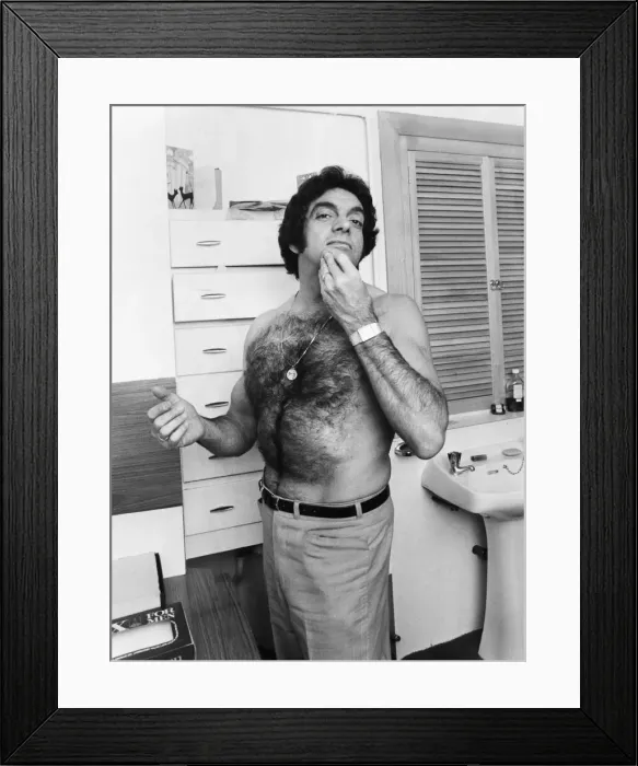 Framed Print : Singer Frankie Vaughan poses in his bathroom at home. December 1970 Framed Print : Singer Frankie Vaughan poses in his bathroom at home. December 1970
