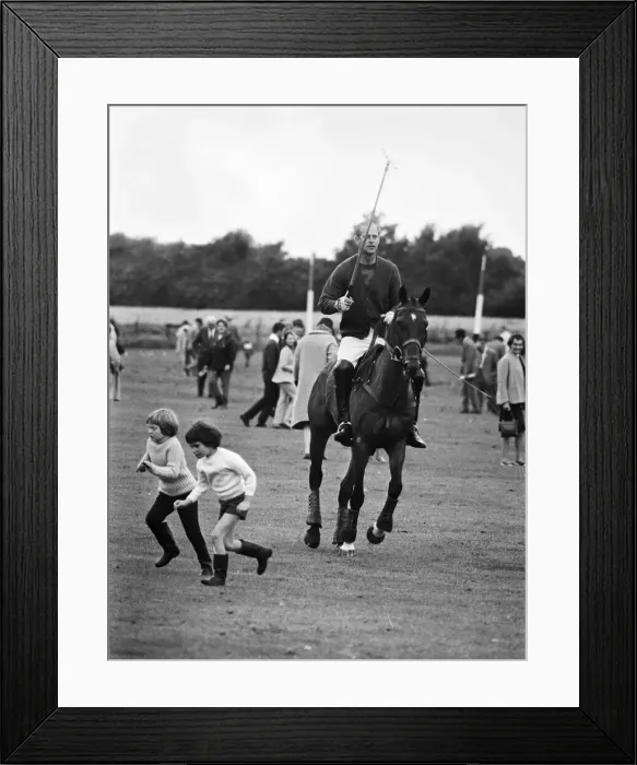 Framed Print : Prince Philip and his son Prince Charles win the Junior County Championship with their