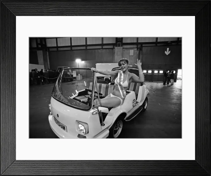 Framed Print : Model Joanne Latham sitting in an electric car. 13th March 1978 Framed Print : Model Joanne Latham sitting in an electric car. 13th March 1978